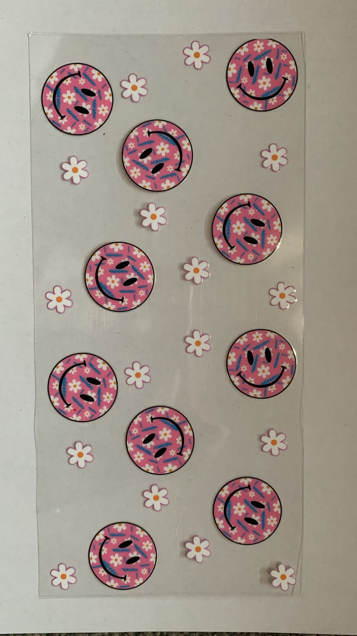 Pink smiley faces and flowers